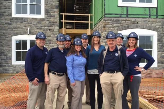 Builder puts finishing touches on housing project