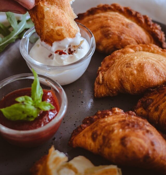 Discover the Flavors of the World with the Downtown Lancaster International Food Tour near 10 Prince Apartments!